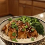 Teriyaki chicken is undeniably one of the most beloved dishes in Japanese cuisine, celebrated for its rich flavors and satisfying texture. Originating from the traditional Japanese cooking method of 'teriyaki,' which involves grilling or broiling meat and glazing it with a sweet and savory sauce, this dish has found its way into the hearts of food enthusiasts worldwide. The Teriyaki Chicken Rice Bowl takes this classic dish to the next level by combining tender pieces of chicken with fluffy rice, creating a balanced meal option that is both nourishing and delicious.
